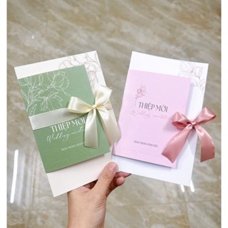 Thiệp cưới Bảo Châu, Thiệp cưới gấp 3 đính nơ lụa, giấy ánh kim thơm, mẫu sang trọng mới nhất 2025
