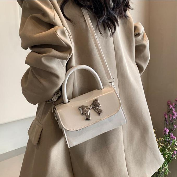 Túi Xách Nữ Mini Cầm Tay Đeo Chéo Hoạ Tiết Nơ Bạc Sang Chảnh Đi Tiệc – HT013 | BigBuy360 - bigbuy360.vn