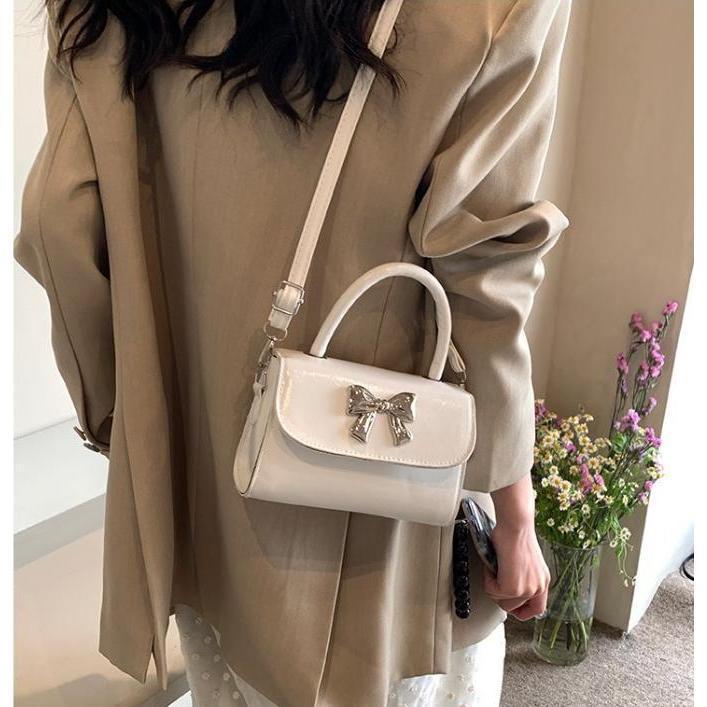 Túi Xách Nữ Mini Cầm Tay Đeo Chéo Hoạ Tiết Nơ Bạc Sang Chảnh Đi Tiệc – HT013 | BigBuy360 - bigbuy360.vn