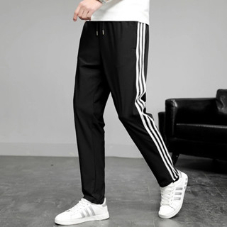 Quần thể dục 3 sọc dáng dài ống suông và bo gấu kiểu jogger tập gym nam nữ unisex có túi lớn màu đen - DTB P3