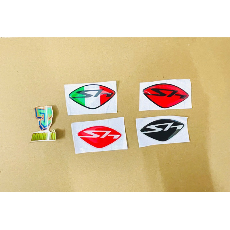 Logo Sh tem nổi nền camay lấp lánh dán mặt nạ xe