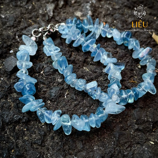 Vòng tay Aqua thô phối charm