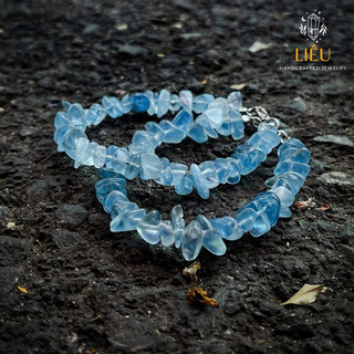 Vòng tay Aqua thô phối charm