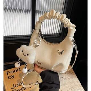 Túi xách nữ quai Rúm đính phụ kiện kèm móc bông cầm tay đeo chéo MP 135