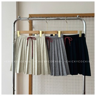  Chân váy len ngắn xếp ly 