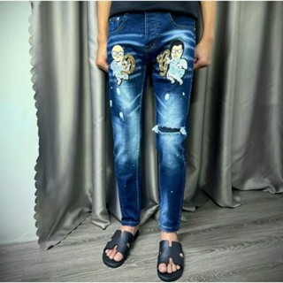 Quần jean nam DSQ Thêu họa tiết ĐÔN CHỀ rách xước gối co dãn tốt mẫu mới cao cấp