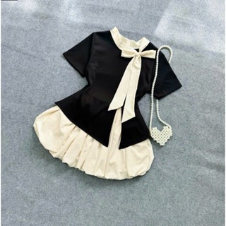 Set bộ bigsize Nữ 60-95kg áo thun kiểu vạt xẻ cột nơ xinh kèm chân váy bí bồng có quần bảo hộ - SET935