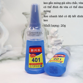 Móng tay giả đính nơ đen trắng ( mỗi bộ gồm 24 móng lớn nhỏ kèm keo dán )