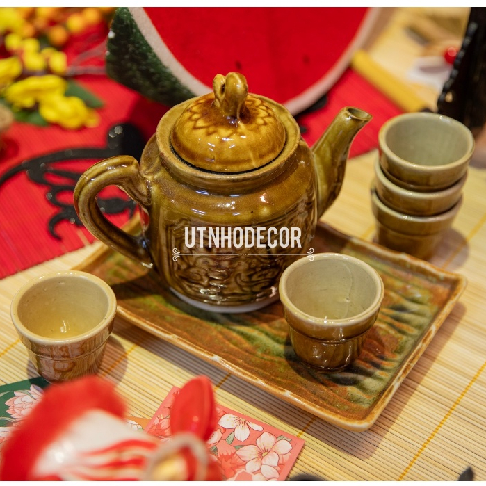 Bộ ấm trà sứ da lươn màu vàng trang trí tết (1 ấm trà + 6 tách trà)