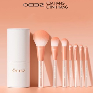 Bộ cọ trang điểm cá nhân OEIEZ gồm 7 cọ đi kèm ống đựng màu trắng với 2 màu cam đào và tím khoai môn