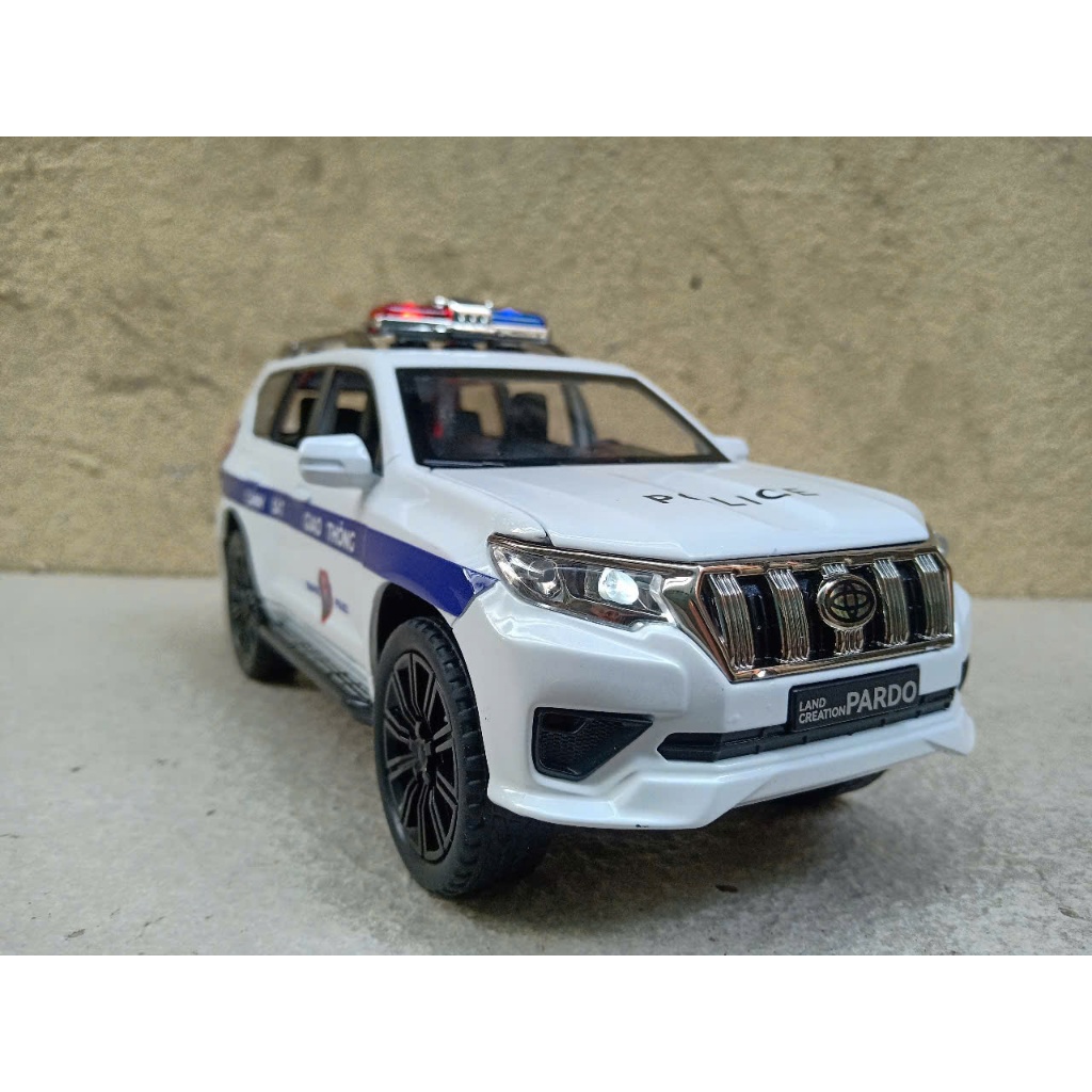 Mô hình xe Police Toyota Prado landCruiser CSGT 1:24