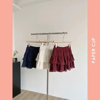 Chân váy xòe chữ A xếp tầng phối viền ren chất nhung mịn họa tiết chấm bi dáng ngắn lưng thun co giãn có quần trong .