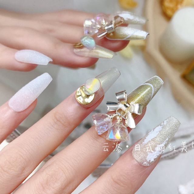 charm chuông gió bạc vàng