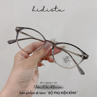 Gọng kính mắt tròn oval dáng nhỏ Melli. Càng kính phối kim loại mảnh, thiết kế siêu nhẹ. Hidi Studio Eyewear