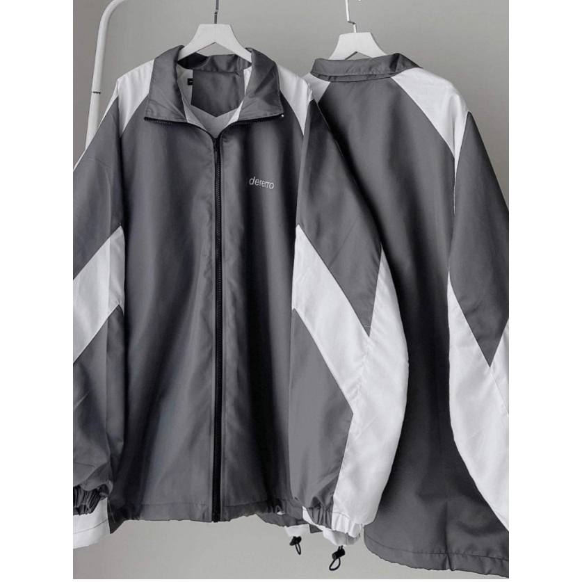 Áo Khoác Gió DERERRO chữ thêu chất liệu dù 3 màu trẻ trung năng động.