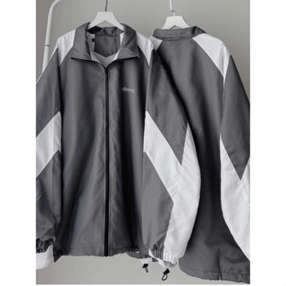 Áo Khoác Gió DERERRO chữ thêu chất liệu dù 3 màu trẻ trung năng động.