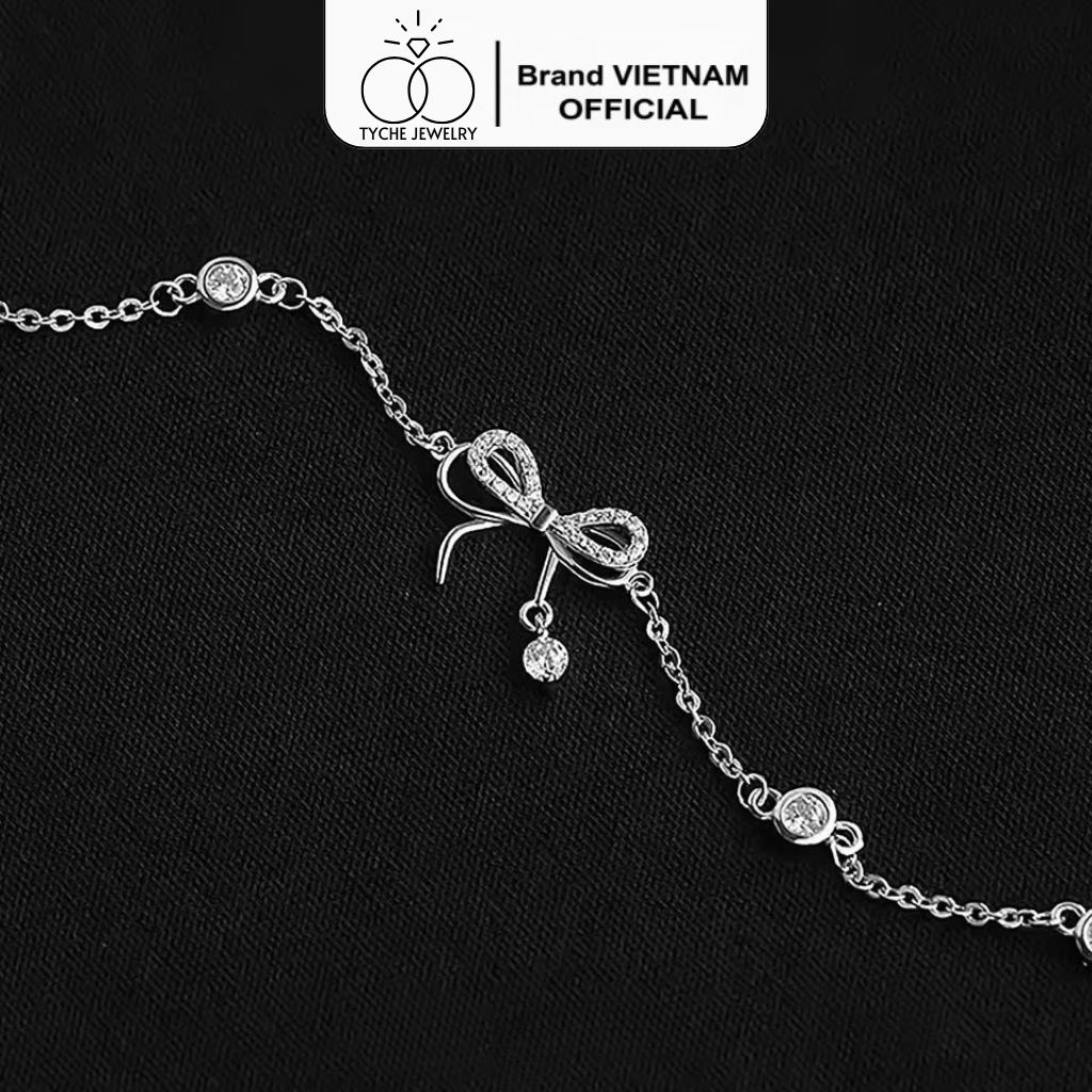 Lắc tay bạc nữ Tyche Camellia, vòng tay nơ treo hạt đá nhẩy lấp lánh TYCHE JEWELRY