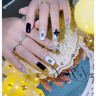 Set charm nơ đính móng đen trắng nail