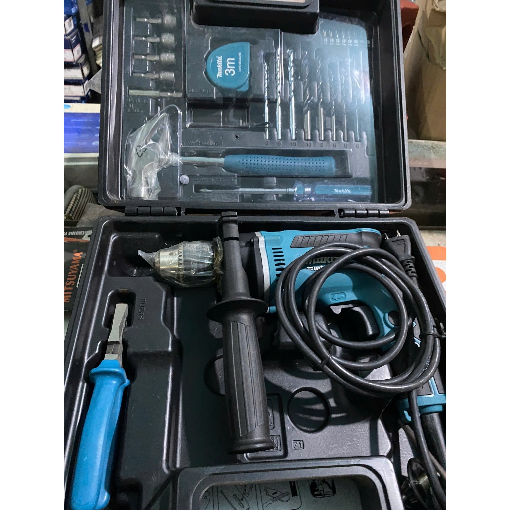 Máy khoan búa và 26 phụ kiện M8103KX2B Makita chính hãng thanh lý