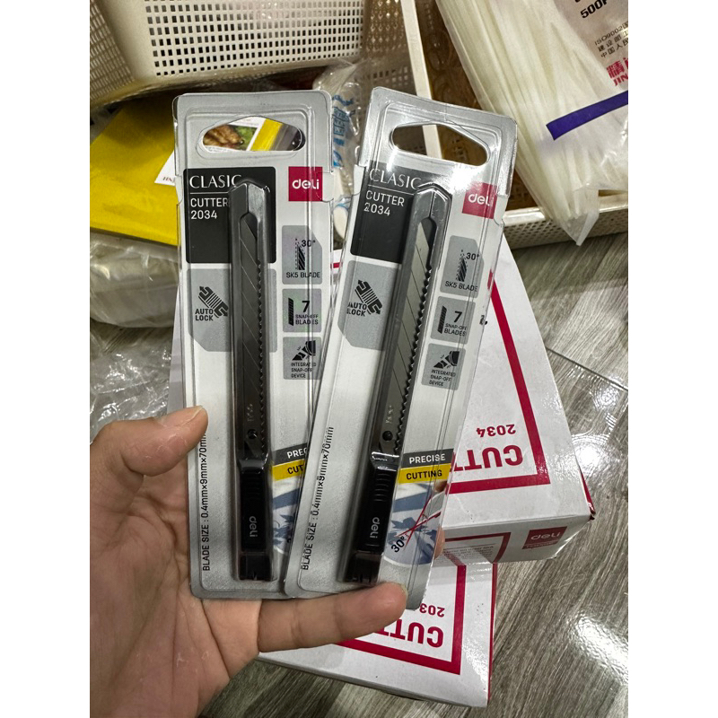 Dao rọc giấy Deli vỏ inox,dao rọc giấy mini