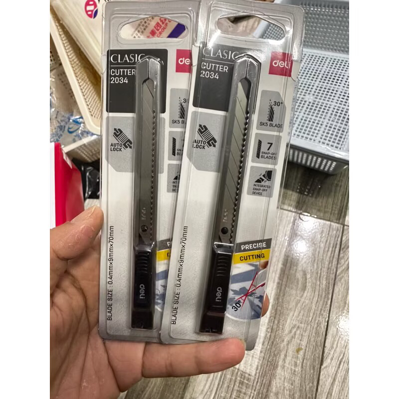 Dao rọc giấy Deli vỏ inox,dao rọc giấy mini bền đẹp