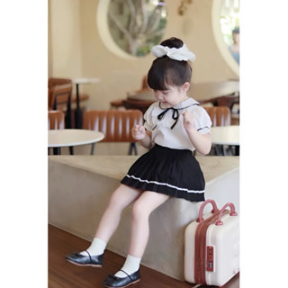 Ong Kis Sét sơ mi cổ sen tay bồng viền lé nổi kèm chân váy tuyết mưa dập ly cho bé gái 10-30kg(từ saz 5 tăng 1 saz)