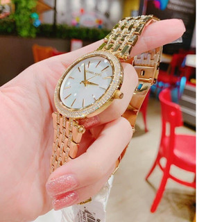 Đồng Hồ Nữ MK3219 Mặt Trắng Xà Cừ Viền Đá Kim Loại Mạ Vàng Máy Pin Size 39mm