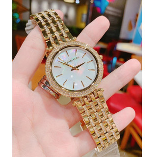 Đồng Hồ Nữ MK3219 Mặt Trắng Xà Cừ Viền Đá Kim Loại Mạ Vàng Máy Pin Size 39mm