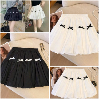 Chân váy bí phồng đính 4 cái nơ bé xinh xinh
