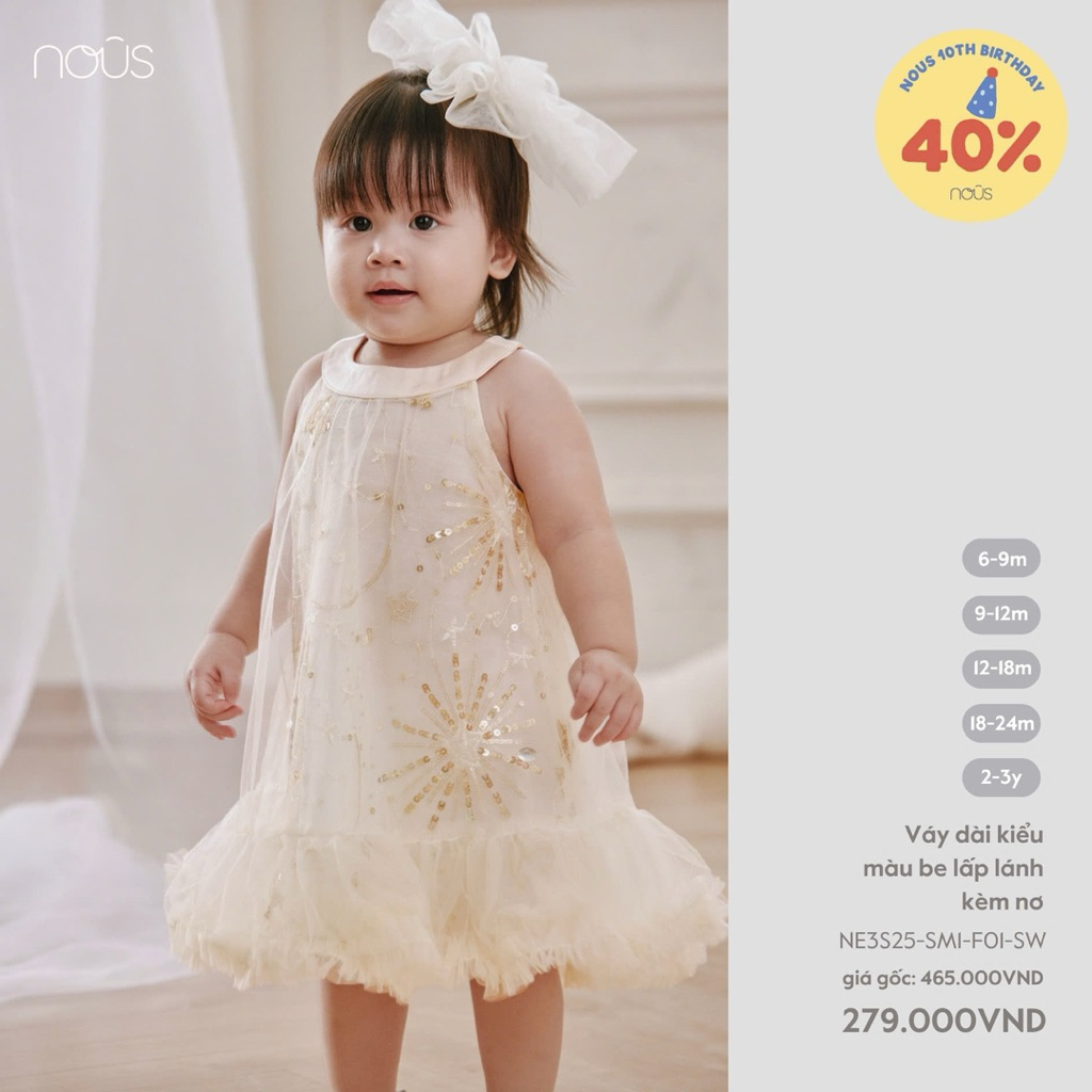 NOUS PARTY 2025 VÁY DÀI KIỂU MÀU BE LẤP LÁNH KÈM NƠ