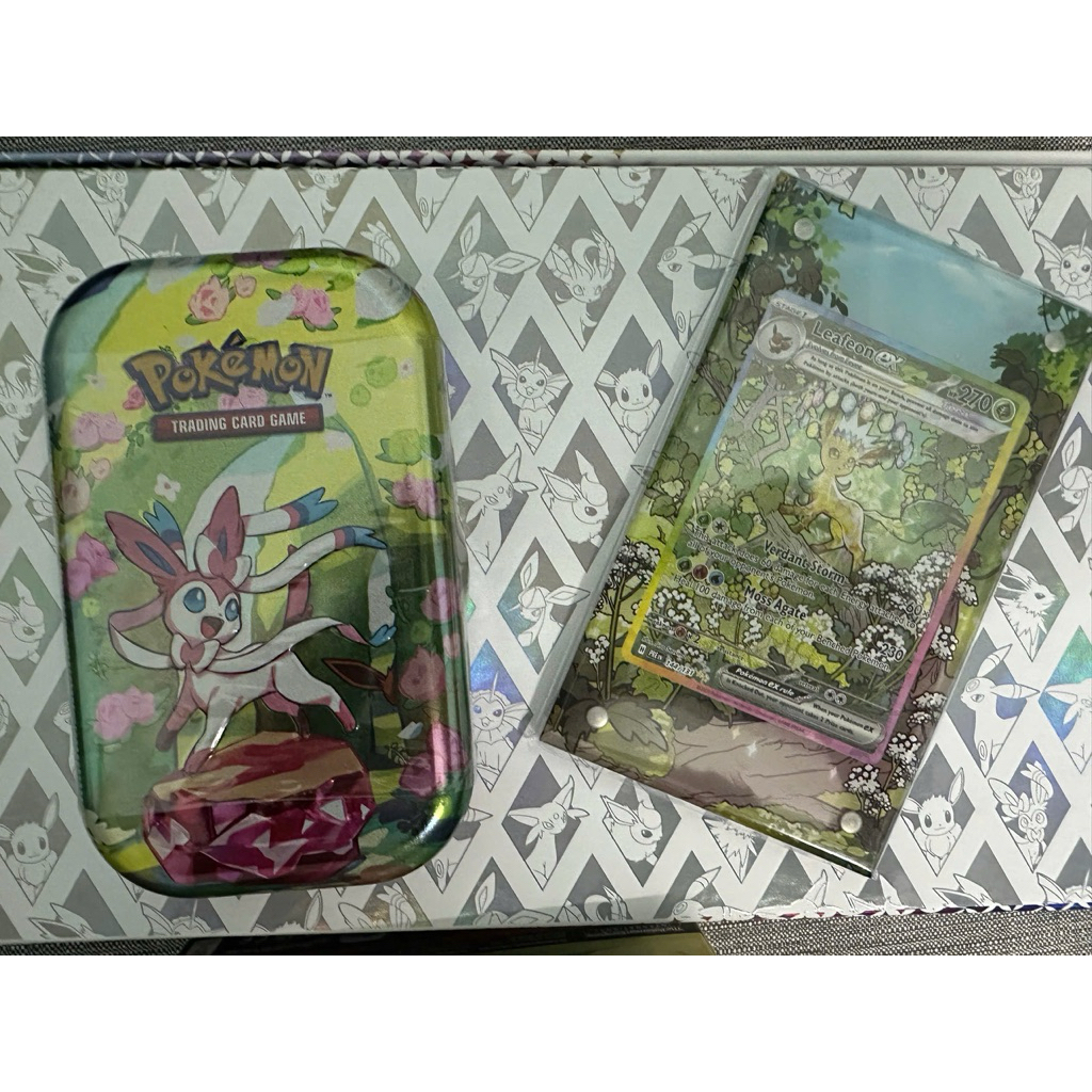 Hộp Prismatic Evolutions mini tin lẻ Pokemon TCG chính hãng