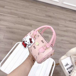Túi xách tay nữ mini hình hộp da PU họa tiết Hello Kitty – có dây đeo chéo, tặng kèm charm bông dễ thương - TXN208