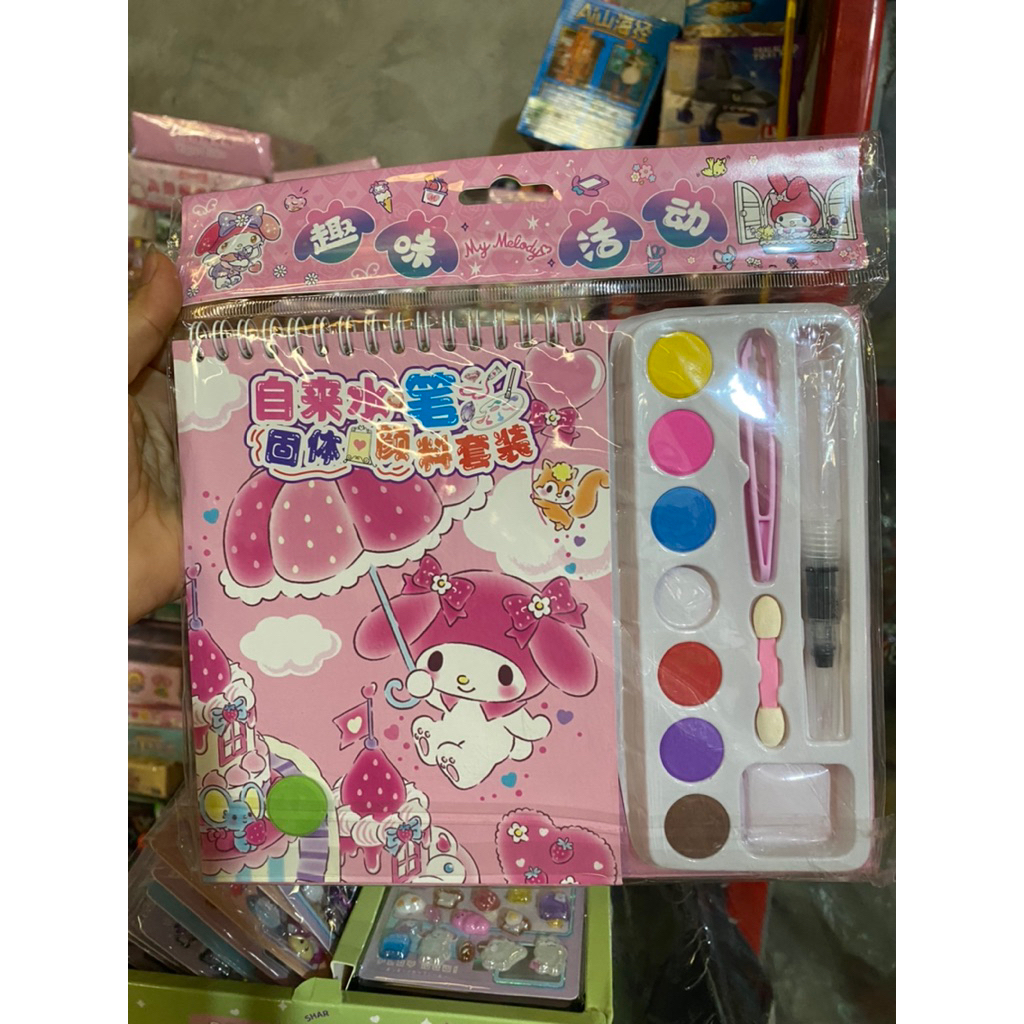 1 quyển sổ lò xo tô màu kèm bút tô