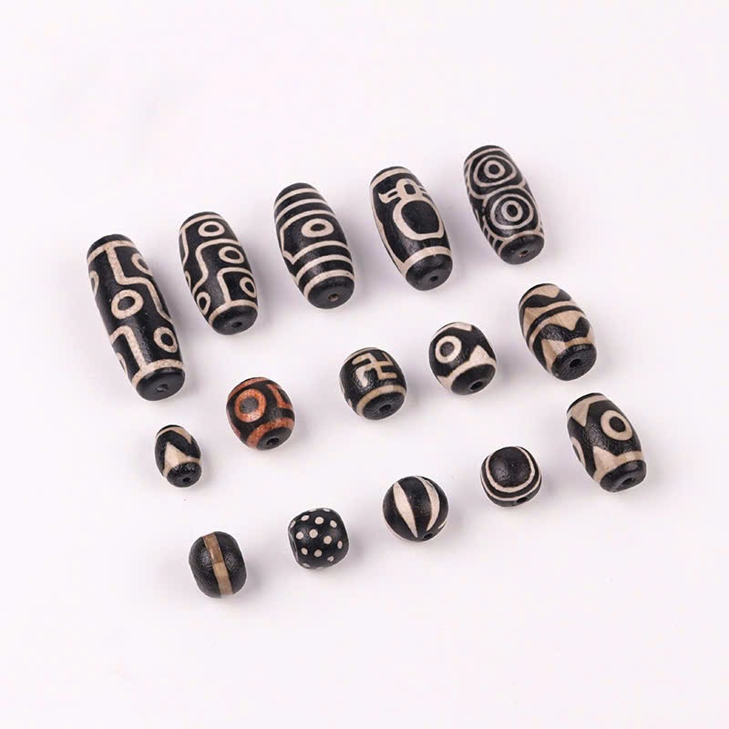 Dzi Thiên Châu Tây Tạng - Một Hạt Bồ Đề - Dzi 3 mắt và 9 mắt