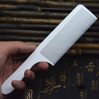 Lược cắt tóc nam lược cong. Lược Cắt Tóc Nam bám tóc.