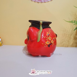 Lợn đất cử nhân tiết kiệm tiền gốm sứ