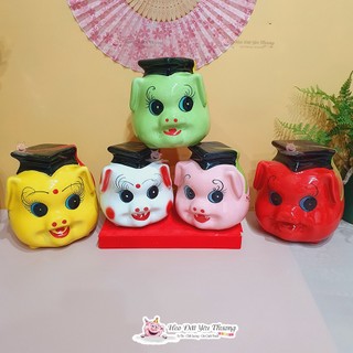 Lợn đất cử nhân tiết kiệm tiền gốm sứ