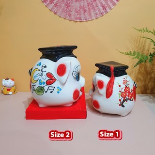 Lợn đất cử nhân tiết kiệm tiền gốm sứ