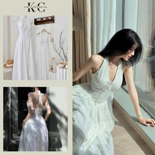 KIM | Đầm trắng xô thêu hoa cổ yếm cột nơ rút dây sau dáng maxi xoè dài chân viền răng cưa