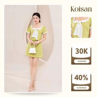 Sét bộ áo Croptop nơ cổ cùng chân váy A KOISAN năng động S2380527