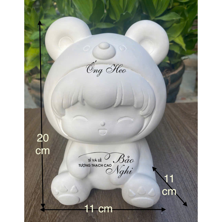 Tượng thạch cao tô màu ống heo hình bé đội mũ gấu