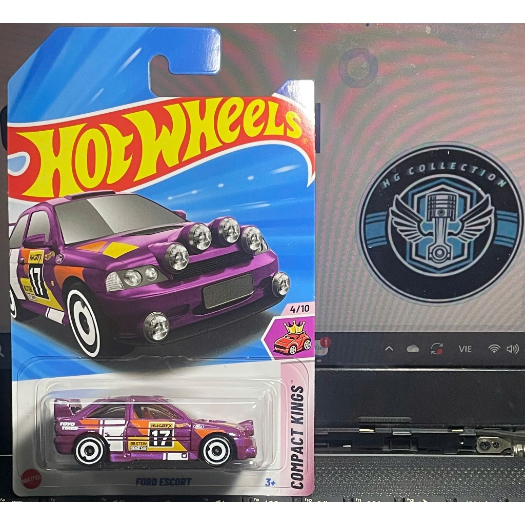 xe đồ chơi mô hình hotwheels basic 2025 case L: Ford Escort