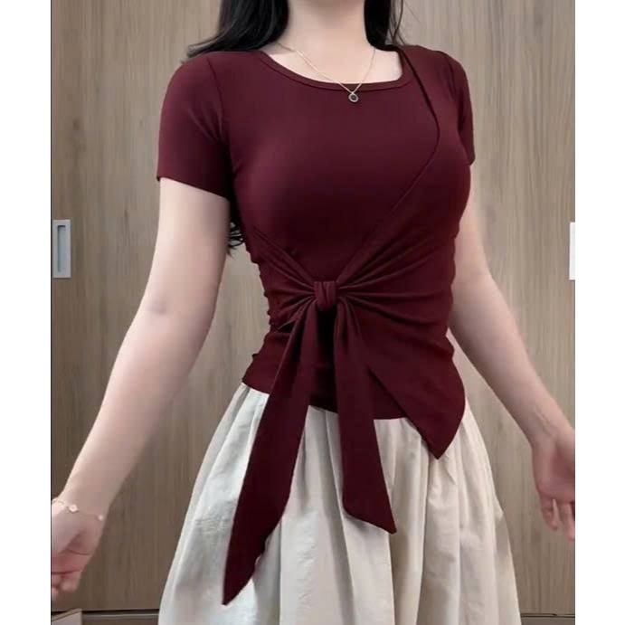 Áo thun nữ phối viền thiết kế dây rời thắt eo vạt xẻ tà vải tăm hàn ôm body thiết kế trẻ trung | BigBuy360 - bigbuy360.vn