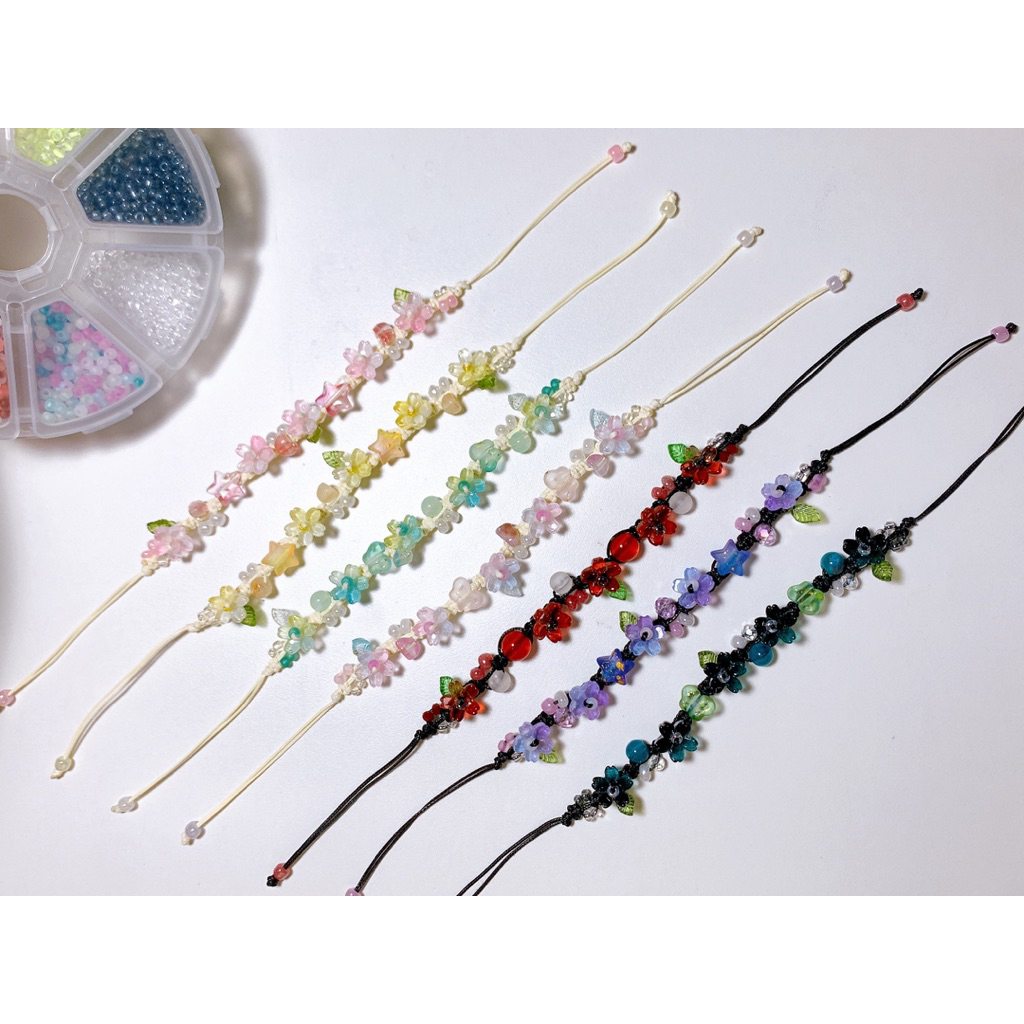 Vòng tay dây sáp rút 5 hoa (ib đổi-mix màu hoa)