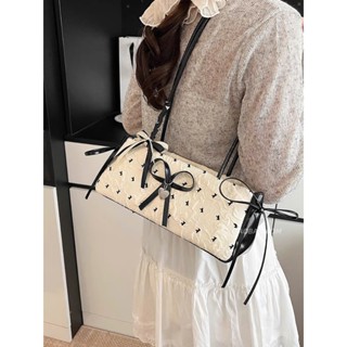  Túi xách nữ đeo vai thời trang Hàn Quốc dáng dài phối nơ ruy băng kèm charm trái tim phong cách dễ thương - TXN109 