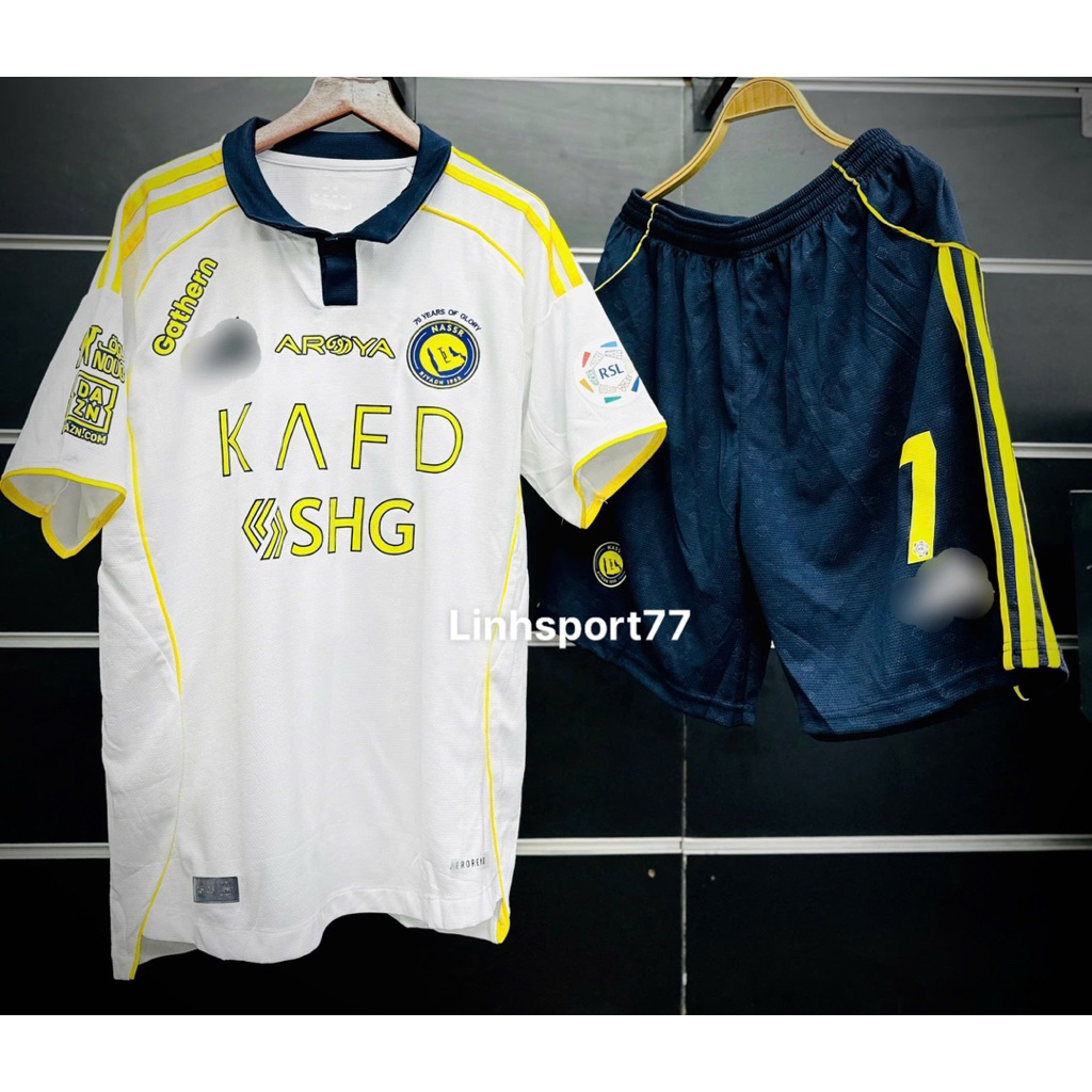 Bộ Quần Áo Al Nassr 25/26 Áo Trắng Vàng có cổ quần xanh than Vải ánh kim mới