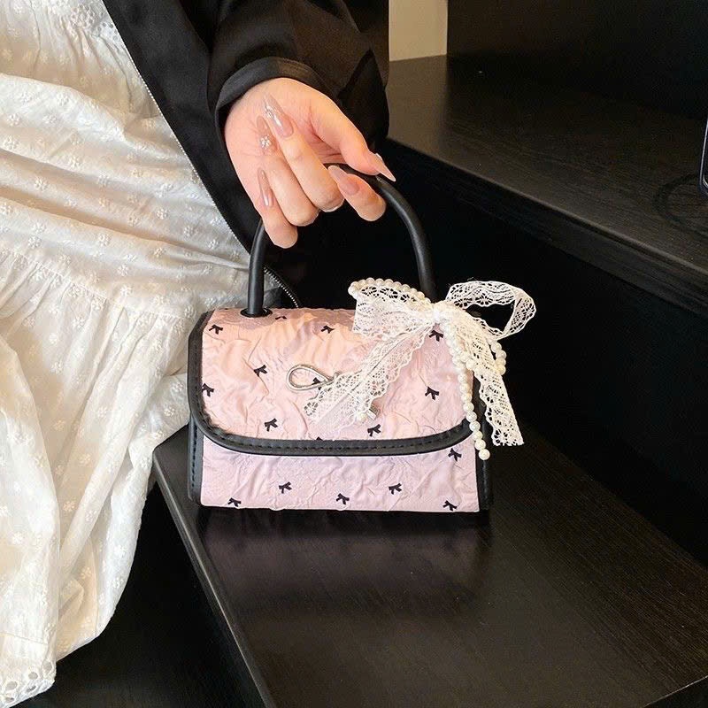 Túi đeo chéo phối nơ màu hồng dễ thương phù hợp phong cách thường ngày - DK024 | BigBuy360 - bigbuy360.vn