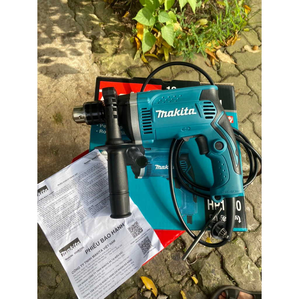 Máy khoan búa cầm tay HP1630