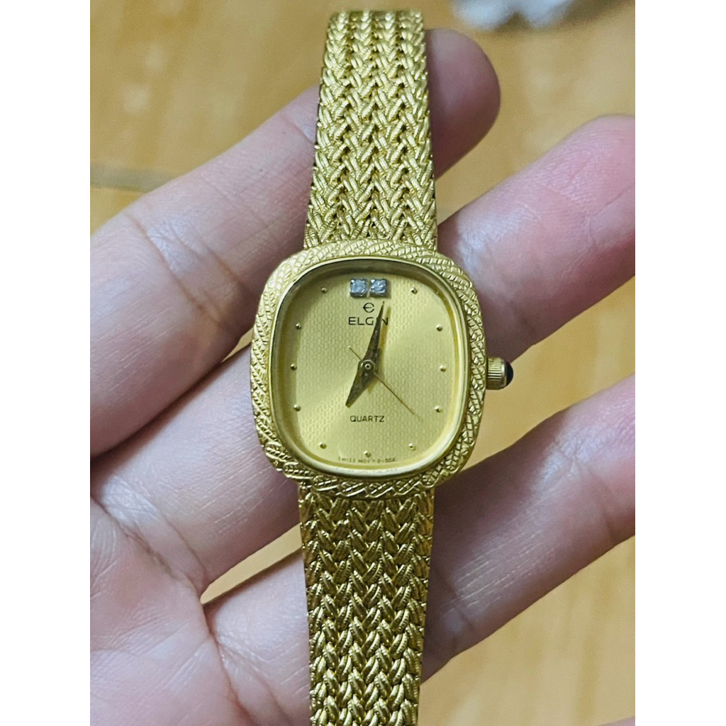 Đồng hồ Elgin Thụy dây lụa vàng siêu mới đẹp.