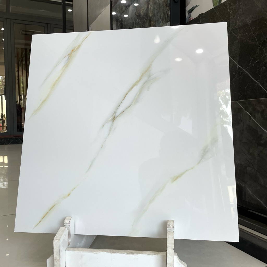 Gạch lát nền 60x60 Trắng Vân Đá điểm vàng